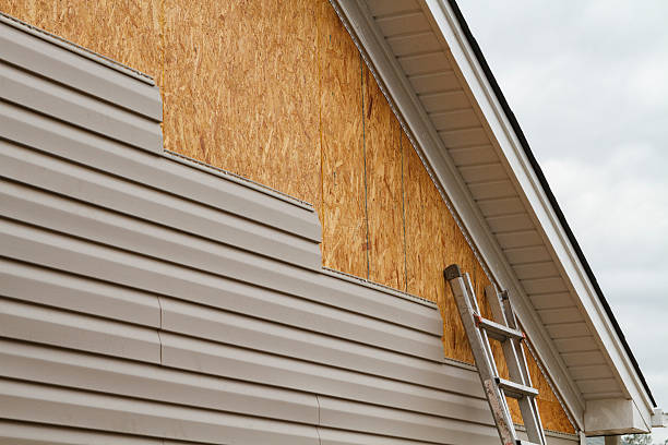 Professional Emergency Siding Repair technician working in Brewster, WA